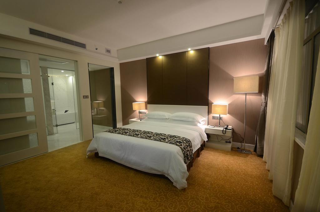 Dongguan Junyue Hotel Zimmer foto